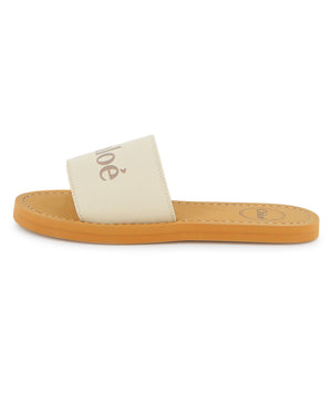 
  
    Chloé
  
 Girls Ivory Canvas Slides