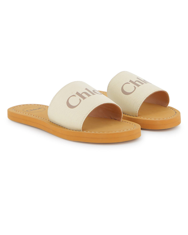 
  
    Chloé
  
 Girls Ivory Canvas Slides