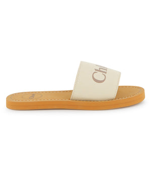 
  
    Chloé
  
 Girls Ivory Canvas Slides