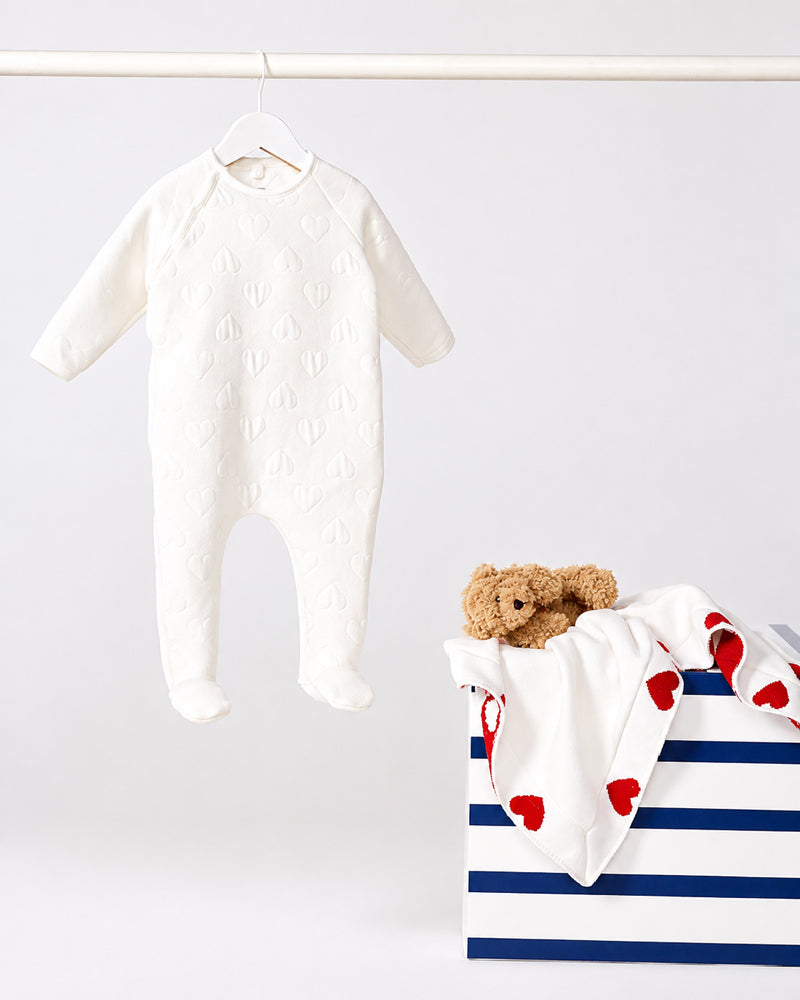 
  
    Petit
  
    Bateau
  
 Baby Ivory Embroidered Heart Onesie