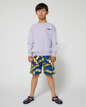 
  
    Kenzo
  
    Kids
  
 Boys Blue Leaf Print Swim Shorts